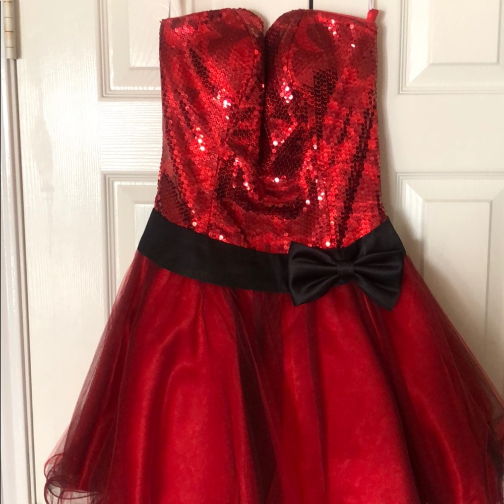 Hannah S red sequin  strapless dress.